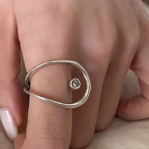 The Innovation Statement Ring adjustable 925 silver and cubic zirconia